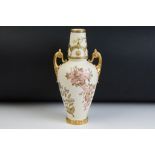 Victorian Royal Worcester twin handled ivory blush vase with gilt and floral detailing. Puce mark to