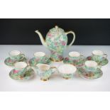 1930s Art Deco Empire lilac time pattern coffee set. The set having a green ground with floral