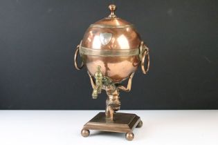 Early 19th century copper samovar, modelled with a kneeling Atlas supporting the globe on his neck