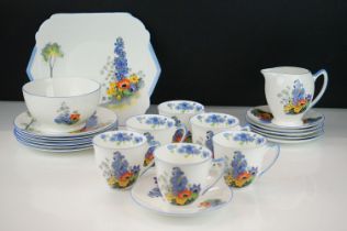 Art Deco Shelley coffee service having a white ground with floral sprays to each and blue rims and