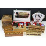 Two Chinese brush sets with associated accessories, and a collection of assorted wooden boxes.