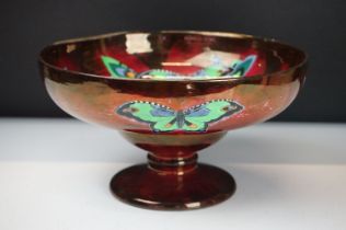 Red glazed footed bowl decorated with butterflies (approx 26cm diameter)