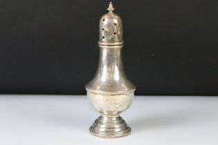 Silver sugar caster, baluster form raised on moulded circular foot, plastic base to foot, head