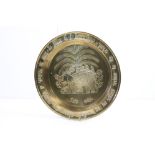 A large vintage brass charger plate presented to Miss C.F Hearnshaw for her selfless service to