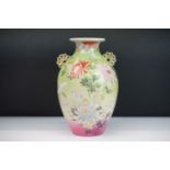 19th Century Japanese twin handled vase. The vase of tapering form with moulded fan handles