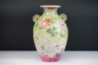 19th Century Japanese twin handled vase. The vase of tapering form with moulded fan handles