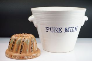 Victorian style ceramic milk pale of tapering form having moulded twin handles and 'pure milk'