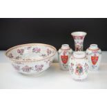 Group of famille rose Chinese export style armorial ceramics, all having a white ground with hand