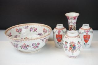 Group of famille rose Chinese export style armorial ceramics, all having a white ground with hand