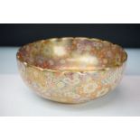 Japanese Satsuma millefleur bowl decorated with gilt and florals with a scalloped rim. Signature