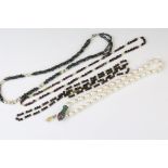 Four beaded necklaces to include two garnet and cultured pearl necklaces, one cultured pearl