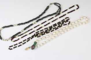 Four beaded necklaces to include two garnet and cultured pearl necklaces, one cultured pearl