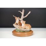 Michael Tandy limited edition ceramic figurine depicting two lion cubs beside a tree branch. Base