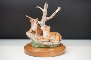 Michael Tandy limited edition ceramic figurine depicting two lion cubs beside a tree branch. Base