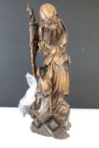 Carved hardwood sculpture of a Japanese man with staff (a/f), with glass eyes, stork to feet. (