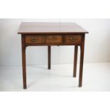 George III Mahogany Fold-over Tea Table fitted with two frieze drawers, raised on square chamfered