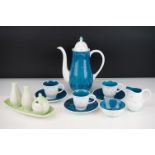 Susie Cooper coffee set having a white ground blue polka dot pattern, consisting of coffee pot,