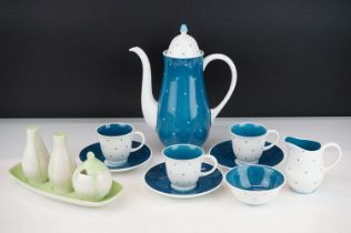 Susie Cooper coffee set having a white ground blue polka dot pattern, consisting of coffee pot,