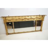 Regency Giltwood Three Pane Overmantle Mirror, with Adams style mouldings of Ram's Heads, Floral