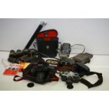 Collection of cameras and binoculars to include a Canon Eos &00 film camera with a 35-80mm lens,