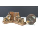 Pair of Black Forest Style carved wooden bookends in the form of Scottie Dogs, with glass eyes (