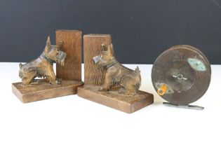 Pair of Black Forest Style carved wooden bookends in the form of Scottie Dogs, with glass eyes (