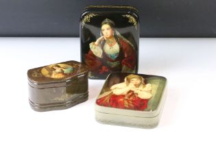 Three hand painted Lacquered lidded boxes, depicting By the Stove, Oleg's Farewell and Deep in