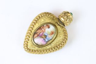 Limoges yellow metal perfume bottle in the form of a heart with a screw top set with a green stone