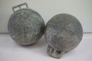 Pair of metal Bouys or fishing net floats. One marked La Coquille. Measures approx 17cm diameter.