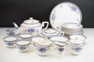 19th Century Victorian Royal Worcester tea service having a white ground with a blue and pink neo