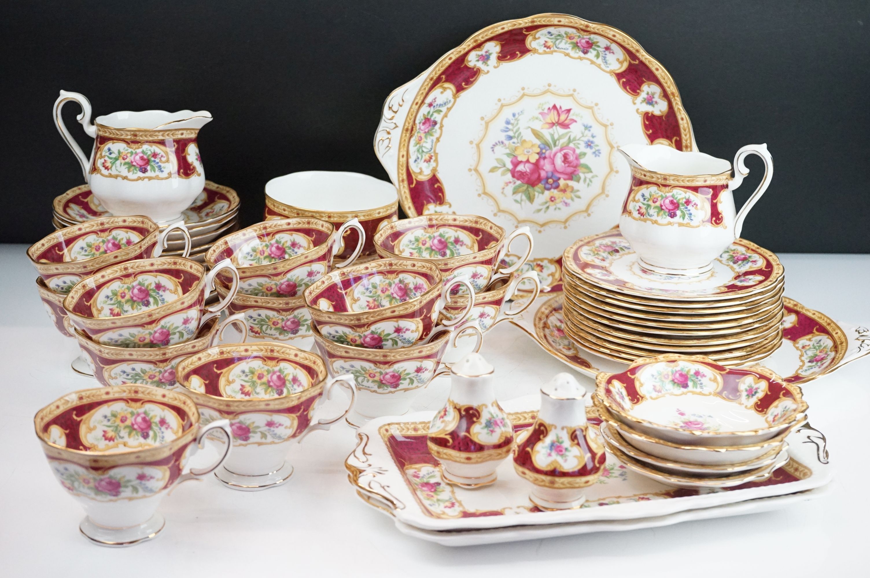 Royal Albert Lady Hamilton tea service consisting of 12 tea cups, 11 saucers, two creamer jugs, salt