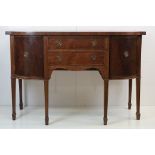 Regency style Mahogany Bow Front Sideboard with an arrangement of two drawers and two cupboard
