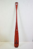 Stained pine paddle with applied Royal Marines badges. (Measures approx 121cm long)