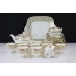 Wedgwood Gold Florentine tea service having a white ground with gilt classical detailing. The lot to