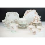 Art Deco Roslyn China Hand Painted Part Tea Set comprising Six Cups, Five Saucers, Six Tea Plates,
