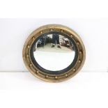 19th century style Gilt Convex Circular Mirror with ebonised slip and ball decoration, 43cm diameter