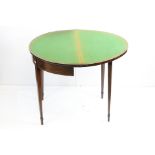 George III Mahogany and Cross-banded Demi-lune Card Table, the folding top opening to a green