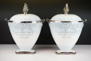 Pair of Wedgwood Millennium Dawning limited edition vases. Each in the form of lidded urns with a