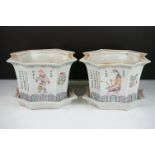 Pair of Chinese porcelain famille rose octagonal jardinere pots. Each hand enamelled with male