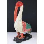 Carved wooden folk art Pelican with painted decoration (approx 50cm high)