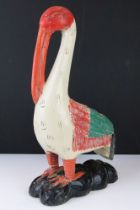 Carved wooden folk art Pelican with painted decoration (approx 50cm high)