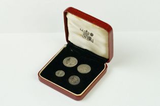 A United Kingdom Royal Mint 1962 Silver Maundy Money Set Of Four Coins Within Red Display Case.