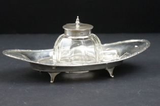 Early 20th Century silver hallmarked ink well having a glass inkwell to the centre with silver lid