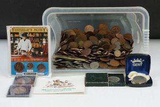 A collection of British pre decimal and foreign coins to include commemorative crowns and one silver