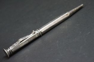 Silver Yard o Lead pen, engraved repeating lozenge and zigzag pattern to the body, hallmarked