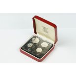 A United Kingdom Royal Mint 1984 Silver Maundy Money Set Of Four Coins Within Red Display Case.