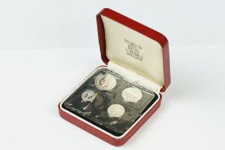 A United Kingdom Royal Mint 1984 Silver Maundy Money Set Of Four Coins Within Red Display Case.