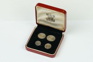 A United Kingdom Royal Mint 1963 Silver Maundy Money Set Of Four Coins Within Red Display Case.