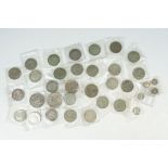 A collection of British pre decimal silver coins to include Crowns, half crowns, double florins,