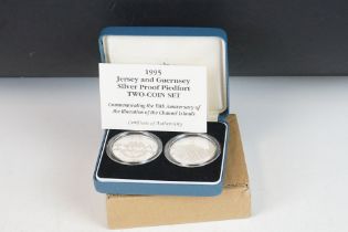 A Royal Mint Jersey and Guernsey silver proof piedfort two coin set commemorating the 50th